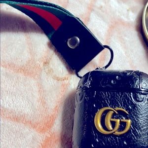 Black Gucci AirPod case